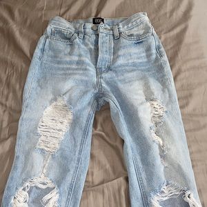 Size 24 BDG jeans, light wash with rips, practically brand new.